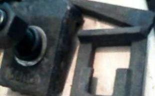 铁路运输安全的关键组件 行车压板与压轨器及其在工矿铁路配件中的应用